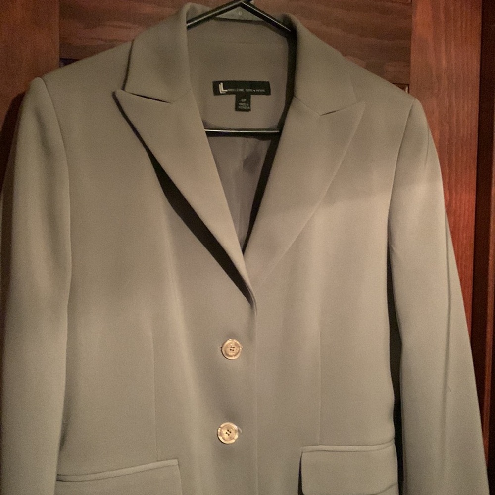 Three piece suit.